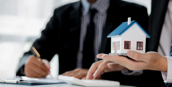 House model and property financing paperwork